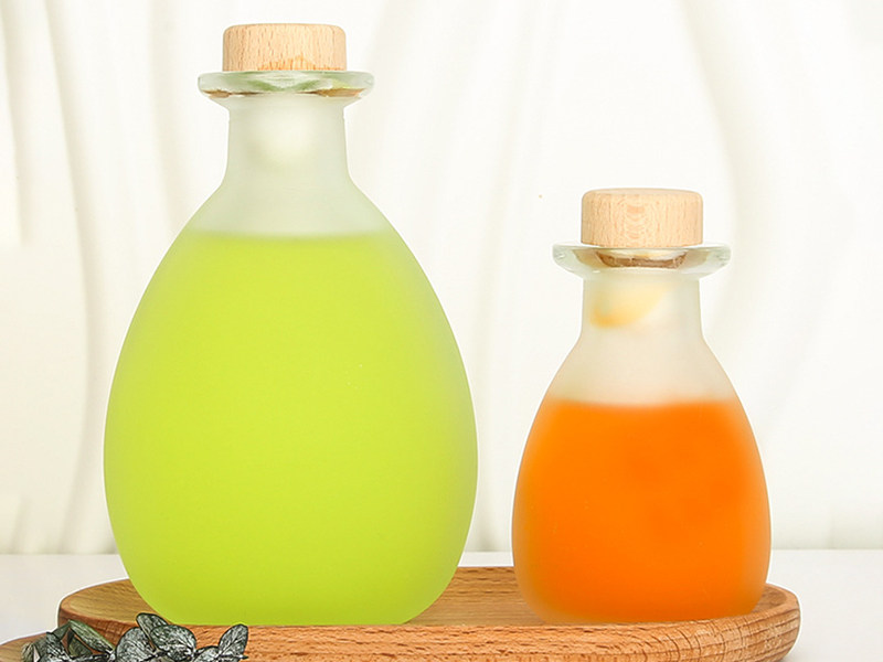 Conical large-mouth frosted glass bottle