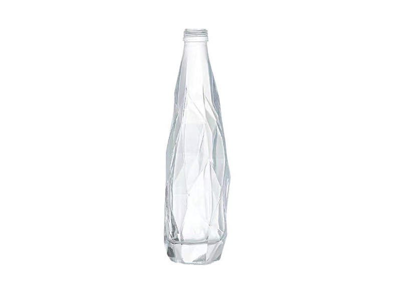 Empty glass bottles of fruit wine