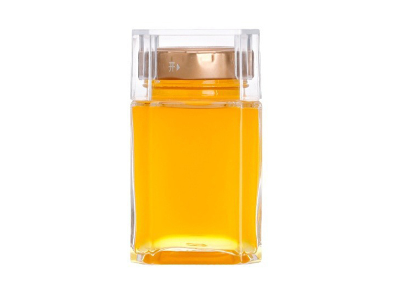 Octagonal glass honey bottle
