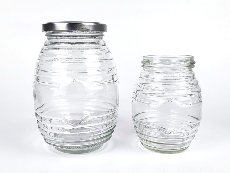 Threaded honey glass storage jar