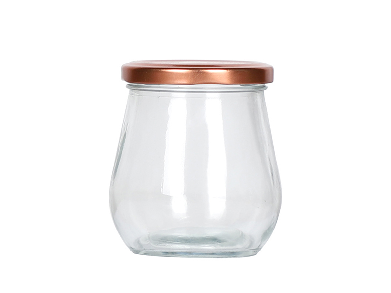 Transparent glass sealed bottle of honey bottle